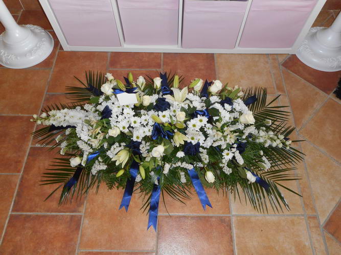 navy and white funeral spray resize